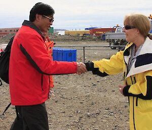 Davis Station Leader shaking hands with Chinese VIP