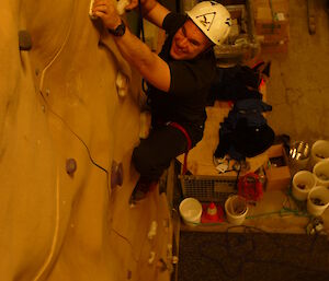 An expeditioner climbing on the route called ‘Stairway'.