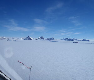 Prince Charles Mountains looming on the horizon