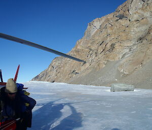 Expeditioners alight from the helicopter at the Prince Charles Mountains