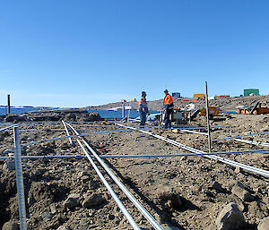 Rebar tie bars that will be unseen laid on the ground as part of the wharf structure