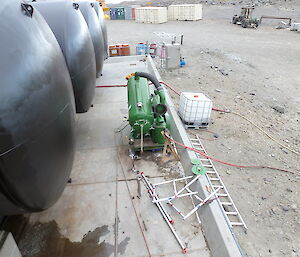 Cleaning the outside of the fuel tanks at Davis