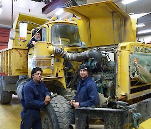 (Pictured from left) Rob Cullen, Jose Campus & Joe Glacken repairing the 1982 RM 6x6 Mack truck.