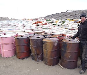 Dave posing with all the drums collected