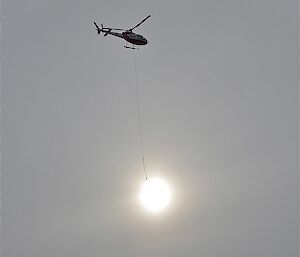 Optical illusion — helicopter with sun on a line