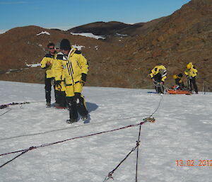 Setting up the stretcher ropes and belay.