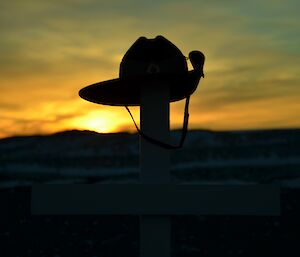 Sunrise at Davis Anzac Day 2012 — sunrise behind army hat