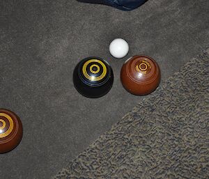 Playing carpet bowls at Davis — a close up of the balls