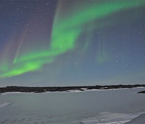 The Aurora Australis and reflection on the sea ice