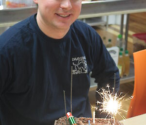 Chris Hill at Davis 2012 posing with birthday cake
