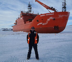 Matt Ryan at Davis on the ice with Aurora Australis in background