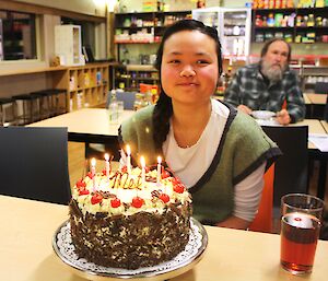 Mel Ho birthday at Davis 2012 posing with cake