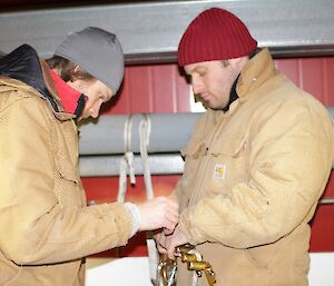 Timo and Mark Baker setting up the main line of the hauling system