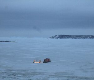 Davis Midwinter swim 2012. A view from afar of the ice pool being dug in the dark