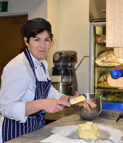 Brigid Dwyer in chef gear at Davis 2012