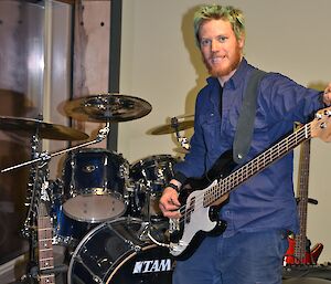 Darryl Seidel tuning a guitar at Davis 2012