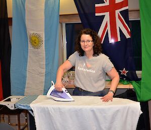 Jan Wallace ironing tablecloths at Davis 2012
