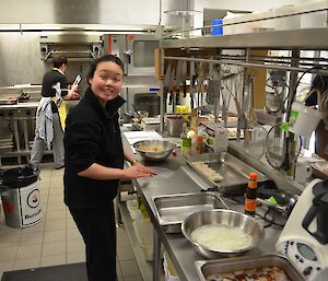 Midwinter dinner preparations. Mel making spring rolls in the kitchen