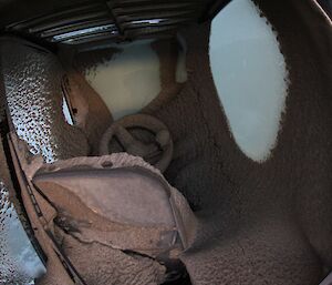 Snow and grit inside cab of JCB loader Davis 2012