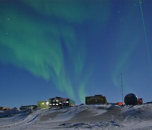 Aurora under the light of the full moon