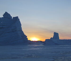 Sunrise and icebergs near Davis