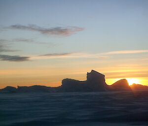 Sun setting over the icebergs