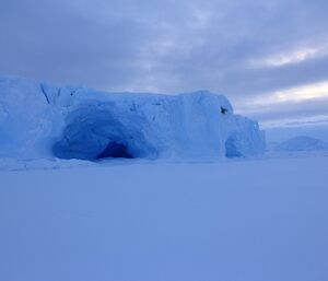 Cave in and iceberg along iceberg alley