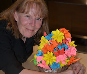 Ali Dean at Davis 2012 posing with paper flowers