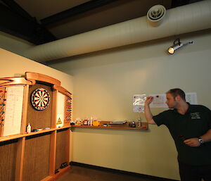 Man playing darts