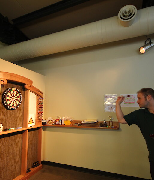 Man playing darts
