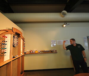 Man playing darts