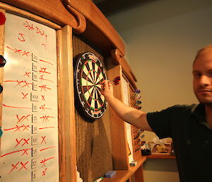 Man playing darts