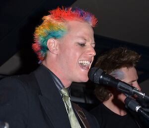 Darryl Seidel at Davis 2012 singing in the band and sporting rainbow coloured hair