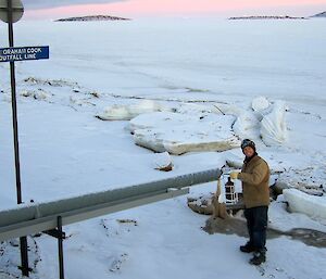 Darryl Seidel taking a sewage sample at Davis 2012