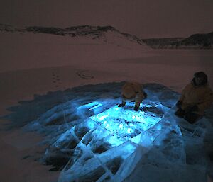 Ice reflected with blue lighting at night