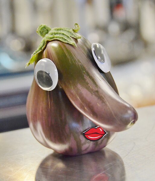 Aubergine with eyes and mouth at Davis