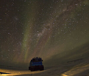 Davis Drive-In 2012 showing a blue Hagg in foreground and a brilliant aurora tinged sky above