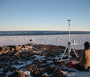 Adam working on the automatic weather station at Kazak Island