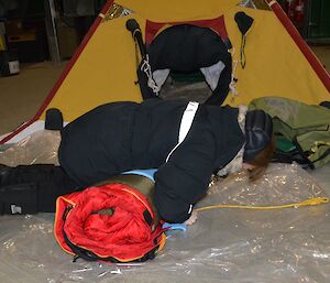 Trip preparations at Davis 2012, tying the bedroll