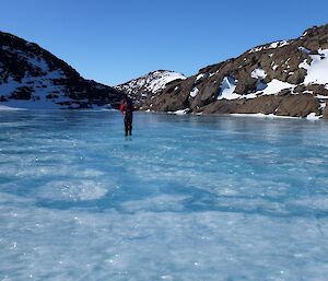 An expeditioner appears to walk on water