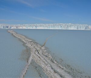 Tide crack and brown glacier