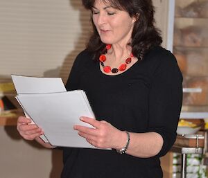 Brigid holding a number of certificates