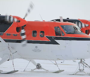 Pilot Richard Adams lands Twin Otter at Davis 2012
