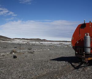 RMIT van in position on Airport Beach with the station in the background