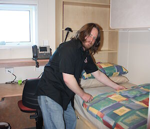Scott in SAM making beds Davis 2012