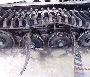 Damaged Hagglund track and slushy sea ice at Davis 2012