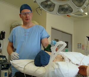 Expedtioner practising with a medical dummy
