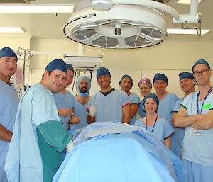 Davis lay surgical team with hospital staff.