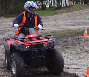 An expeditioner on a quad bike
