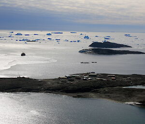 Aurora Australis with refueling hose laying on top of the water into station